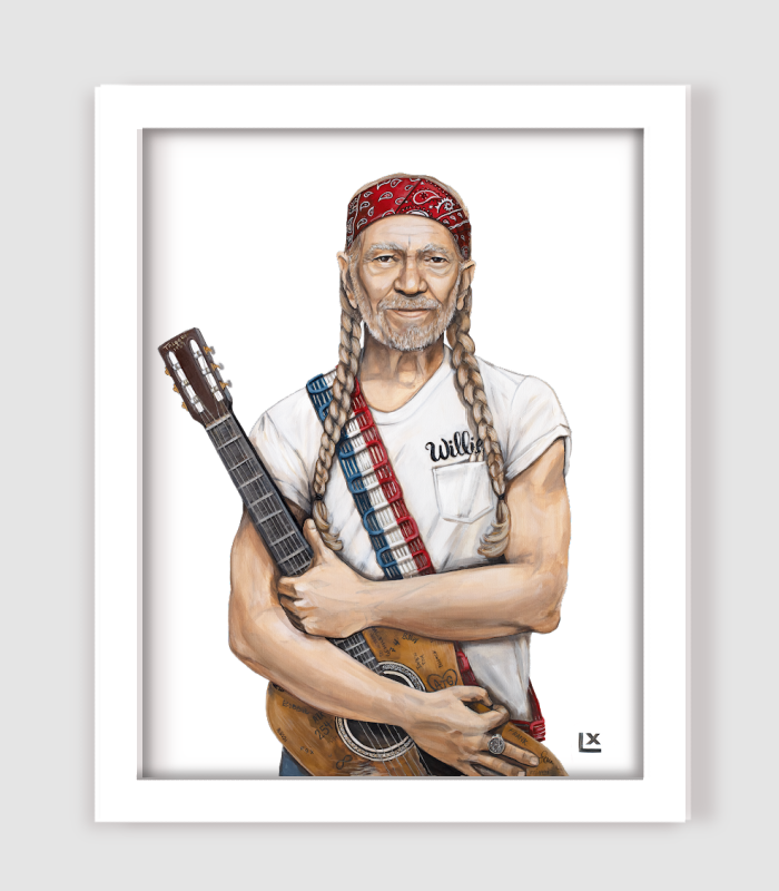 Framed Paper print of Willie Nelson wearing red white and blue with guitar